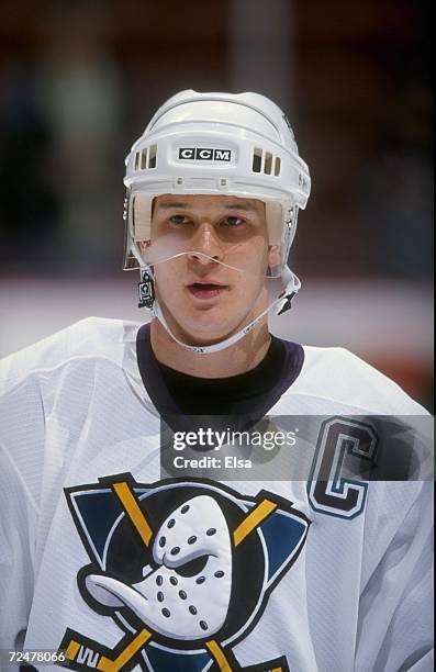 Leftwinger Paul Kariya of the Anaheim Mighty Ducks looks on during the game against the Carolina Hurricanes at the Arrowhead Pond in Anaheim,...