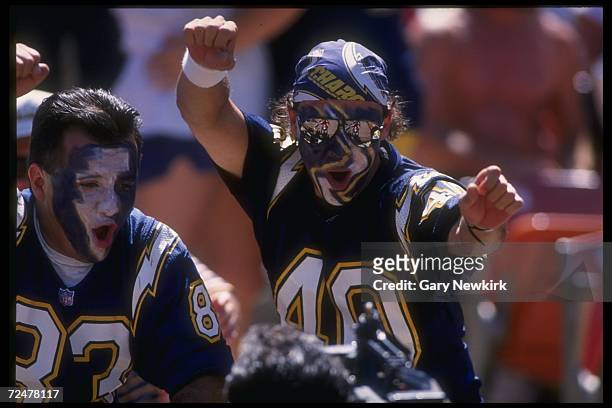 San Diego Chargers fans look on during a game against the Cincinnati Bengals at Jack Murphy Stadium in San Diego, California. The Chargers won the...