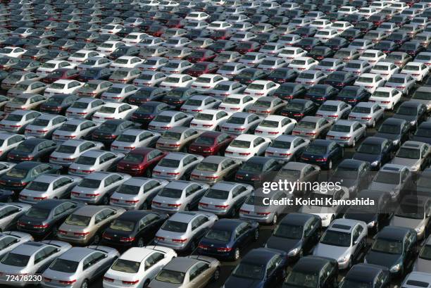 About 3,000 Honda cars wait to be exported to North America at a port January 17, 2003 in Chiba, Japan. The strength of the Japanese yen against the...