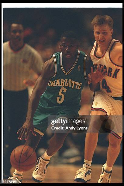Guard Anthony Goldwire of the Charlotte Hornets works against a New York Knicks player during a game at Madison Square Garden in New York City, New...