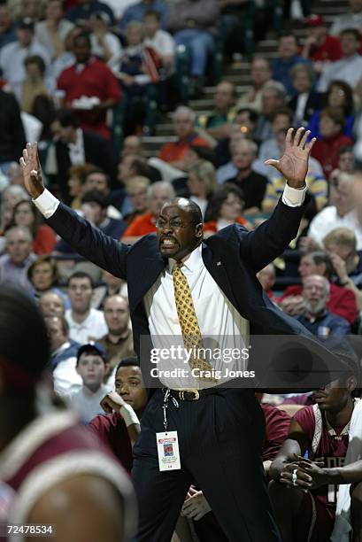 Head coach Steve Robinson of Florida State directs his tam against Maryland during the ACC Tournament game at the Charlotte Coliseum in Charlotte,...
