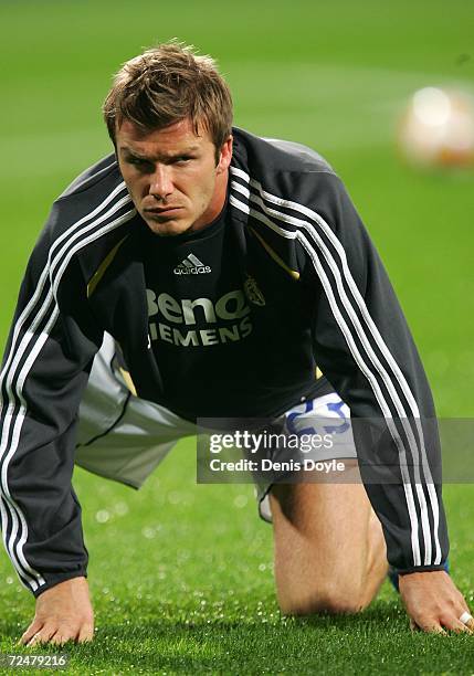 David Beckham of Real Madrid warms up before the Kings Cup fourth round second leg match at the Santiago Bernabeu stadium on November 9, 2006 in...