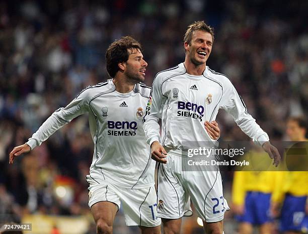 David Beckham of Real Madrid celebrates with Ruud van Nistelrooy after scoring a goal against Ecija during the Kings Cup fourth round second leg...