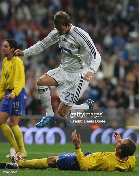 David Beckham of Real Madrid scores a goal against Ecija during the Kings Cup fourth round second leg match between Real Madrid and Ecija at the...