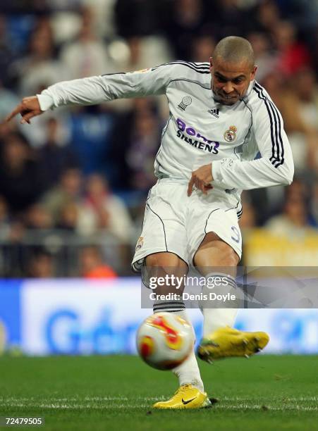 Ronaldo of Real Madrid scores a goal against Ecija in the Kings Cup fourth round second leg match at the Santiago Bernabeu stadium on November 9,...