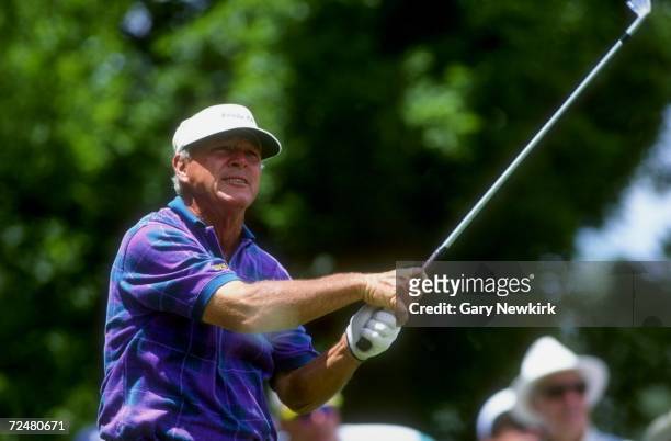 Arnold Palmer hits a shot during the 1993 U.S. Senior Open at the Cherry Hills Golf Course in Englewood, Colorado. Mandatory Credit: Gary Newkirk...