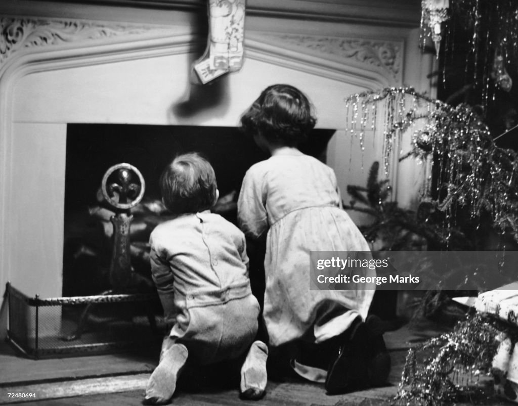 Two children waiting for Santa Claus