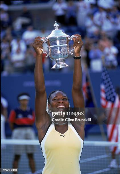 Serena Williams of the USA holds up her trophy after winning the Womens Singles during the US Open at the USTA National Tennis Courts in Flushing...