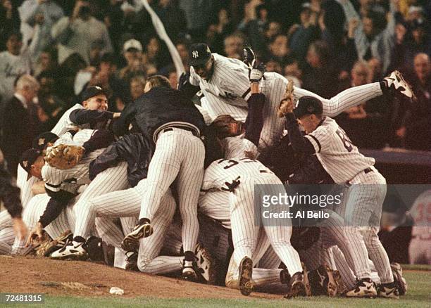The New York Yankees celebrate their 3-1 victory over the Atlanta Braves to take the World Series in game 6 of the World Series at Yankee Stadium in...