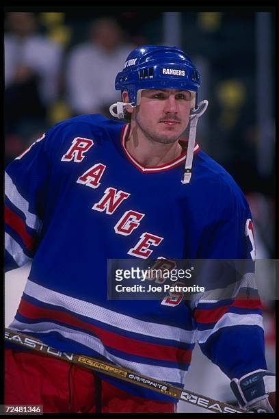 Leftwinger Darren Langdon of the New York Rangers looks on during a game against the Dallas Stars at Reunion Arena in Dallas, Texas. The game was a...