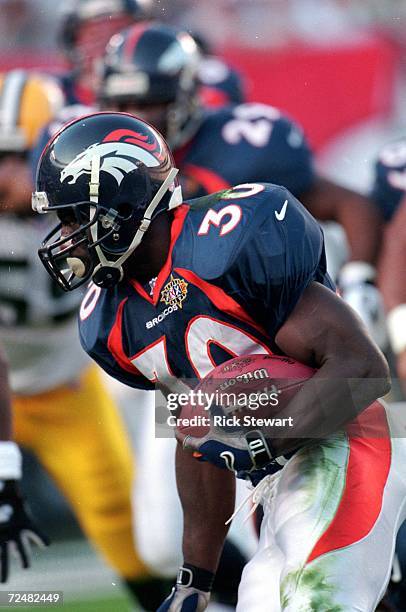 Terrell Davis of the Denver Broncos in action during the NFL Super Bowl XXXII Game against the Green Bay Packers at the Qualcomm Stadium in San...