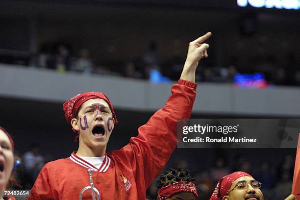 Oklahoma band member cheers for the team during the NCAA Men's basketball championship game against University of Illinois at Chicago first round...