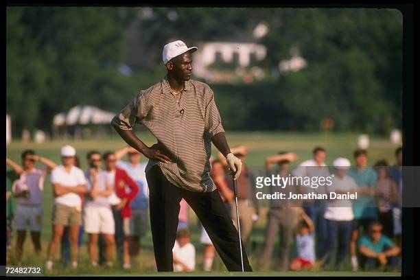 Guard Michael Jordan of the Chicago Bulls at a golfing event.