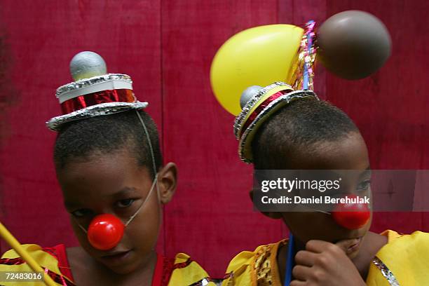 Young Samba Dancers wait for their turn to make their way down Rio Branco Avenue during Rio Carnaval 2005 at Cinelandia on February 5, 2005 in Rio De...