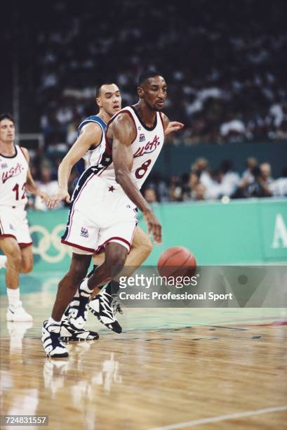 American basketball player Scottie Pippen pictured in action for the United States basketball team to progress to finish in first place in the...