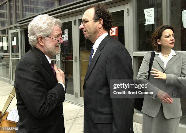 Andrea Yates'' defense team George Parnham and Wendell Odom talk in front of the Harris County Courthouse next to expert witness Dr. Lucy Puryear , a...