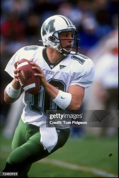 Quarterback Chad Pennington of the Marshall Thundering Herd drops back to pass during a game against the Bowling Green Falcons at Doyt L. Perry Field...