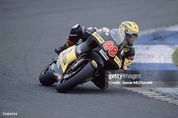 Katja Poensgen of Germany in action for the Dark Dog Racing Team during the 250cc class British Grand Prix held at Donington Park in Leicestershire,...