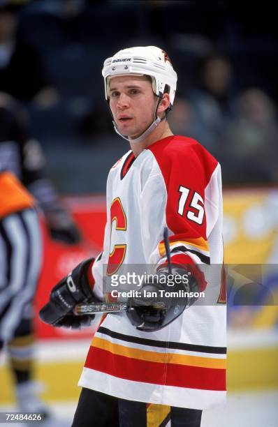Martin St. Louis of the Calgary Flames waits on the ice during a game against the Pittsburgh Penguins at the Canadian Airlines SaddleDome in Calgary,...