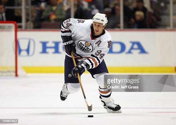 Ryan Smyth of the Edmonton Oilers skates the puck through neutral ice against the Anaheim Ducks during the game at the Honda Center on October 25,...