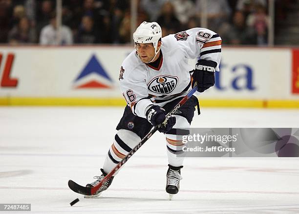 Jarret Stoll of the Edmonton Oilers skates the puck through neutral ice against the Anaheim Ducks during the game at the Honda Center on October 25,...