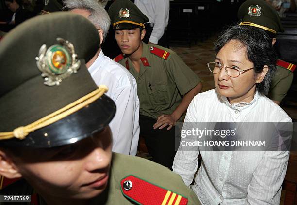 Ho Chi Minh City, VIET NAM: American national Huynh Bich "Linda" Lien , one of the seven accused of terrorism, waits for the start of her trial at...