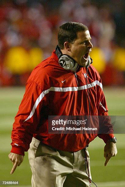 Head coach Greg Schiano of the Rutgers Scarlet Knights screams from the sidelines against the Louisville Cardinals at Rutgers Stadium on November 9,...