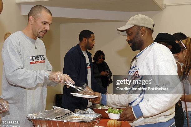 Jason Kidd of the New Jersey Nets serves an early Thanksgiving meal at the Salvation Army on November 9, 2006 in Montclair, New Jersey. NOTE TO USER:...