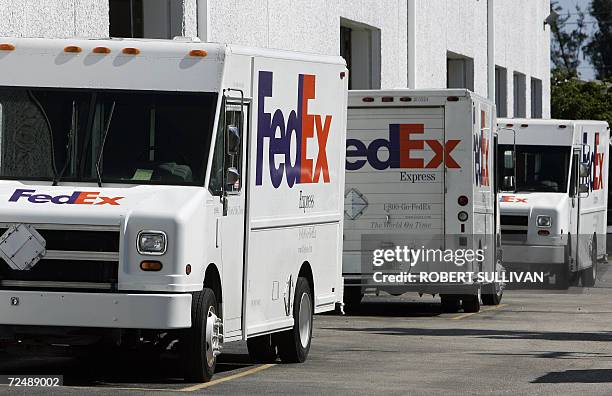 Fedex trucks sit outside a distribution site 09 November 2006, in Miami, Florida. The world's largest cargo carrier uses a fleet of over 671 aircraft...