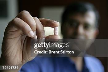 Man holds Aids medication on June 22, 2006 in New Delhi, India. Ranbaxy Pharmaceuticals is one of the first companies in the world to put forward the...