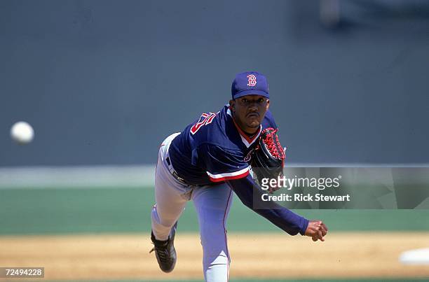 Pedro Martinez of the Boston Red Sox winds back to pitch the ball during the Spring Training Game against the Texas Rangers at Charlotte County...