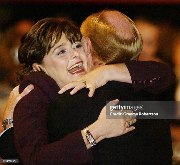 Former Labour leader and outgoing EU commissioner Neil Kinnock greets Cherie Blair moments before Britain's Prime Minister Tony Blair keynote speech...