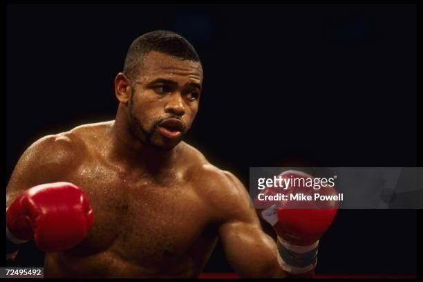 Boxer Roy Jones Jr. Stands and delivers some punches against opponent Vinny Pazienza. Jones retained his International Boxing Federation Super...