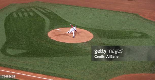Pitcher Curt Schilling of the Boston Red Sox throws a pitch against the St. Louis Cardinals in the first inning during game two of the World Series...