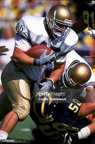 Joey Goodspeed of the Notre Dame Fighting Irish carries the ball during the game against the Michigan Wolverines at the Michigan Stadium in Ann...