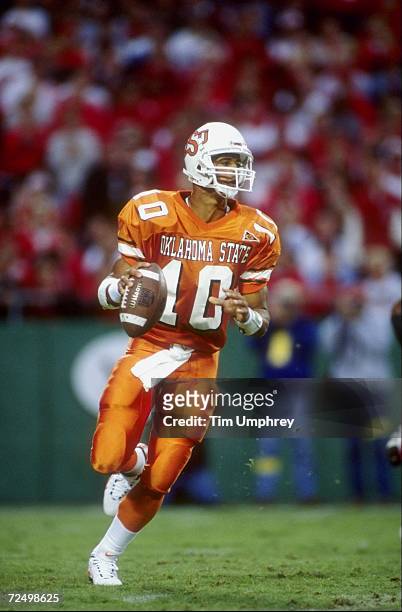 Quarterback Tony Lindsay of the Oklahoma State Cowboys in action during the game against the Nebraska Cornhuskers at the Arrowhead Stadium in Kansas...