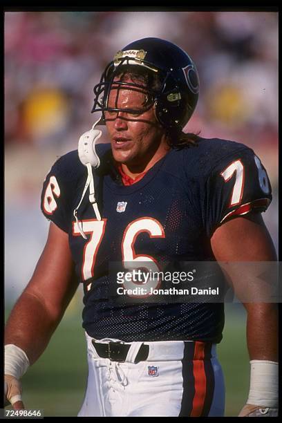 Defensive lineman Steve McMichael of the Chicago Bears looks on during a game against the Minnesota Vikings at Soldier Field in Chicago, Illinois....