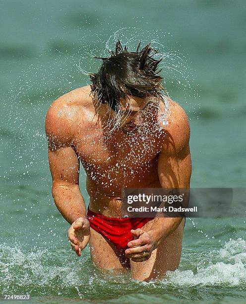 Scott West of the Bulldogs shakes the water from his hair during the Western Bulldogs recovery session at Port Melbourne, Melbourne, Australia on...