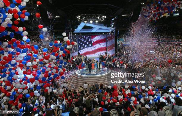 Balloons fall from the ceiling following U.S. President George W. Bush's speech accepting his party's nomination on the final night of the Republican...