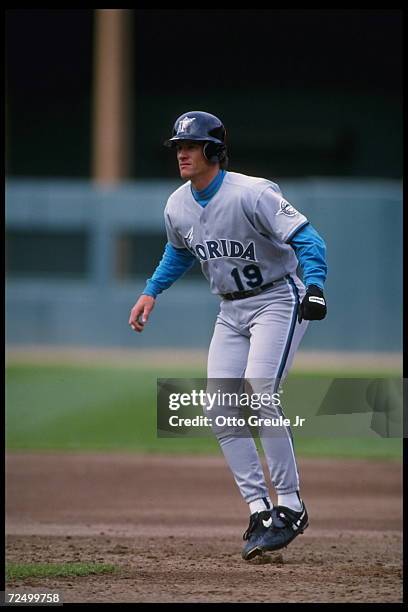 Left fielder Jeff Conine of the Florida Marlins leads off of base as a teammate bats at Candlestick Park in San Francisco, California, against the...