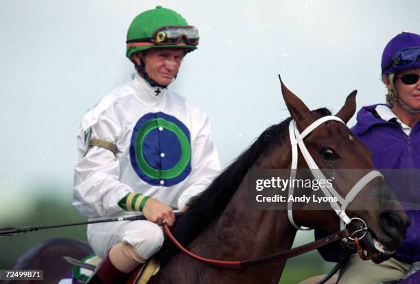 Surfside ridden by Pat Day walks on the track before the Juvenile Fillies during the Breeders Cup at the Gulfstream Park in Hallandale Beach,...