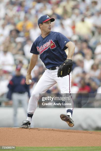 Greg Maddux of the Atlanta Braves delivers during the spring training game against the Cleveland Indians at the Wide World of Sports Complex in Lake...