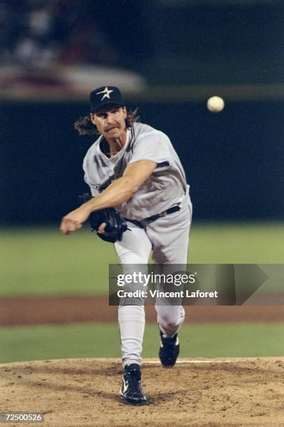 Pitcher Randy Johnson of the Houston Astros throws a pitch during a game against the St. Louis Cardinals at Busch Stadium in St. Louis, Missouri. The...