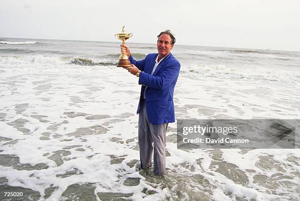 Dave Stockton of the USA celebrates on the beach with the Cup, September 29 1991, after victory in the Ryder Cup at Kiawah Island in South Carolina,...