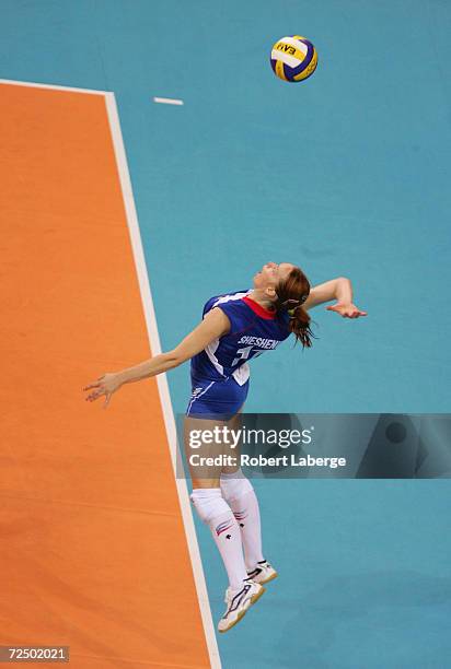 Marina Sheshenika of Russia serves to the USA during the women's indoor Volleyball preliminary match on August 20, 2004 during the Athens 2004 Summer...