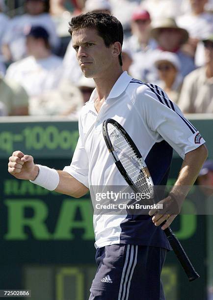 Tim Henman of Great Britain celebrates a point against Lars Burgsmuller of Germany during the Nasdaq-100 Open at The Tennis Center at Crandon Park in...