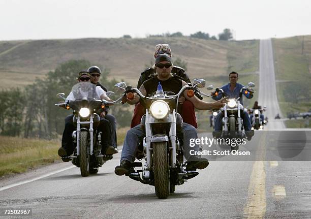 Bikers head toward Sturgis, South Dakota on August 7, 2003 for day four of the annual Sturgis Motorcycle Rally. The weeklong rally attracts an...