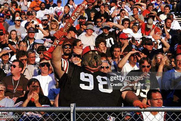 Fan of the Cleveland Browns dresses up in a dog costume to show support of the Dog Pound during the Hall of Fame Game against the Dallas Cowboys at...