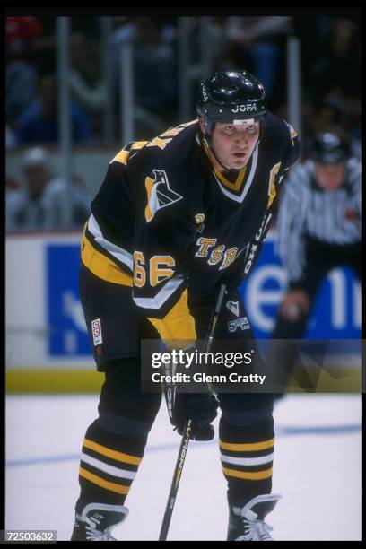 Center Mario Lemieux of the Pittsburgh Penguins looks on during a game against the Anaheim Mighty Ducks at Arrowhead Pond in Anaheim, California. The...