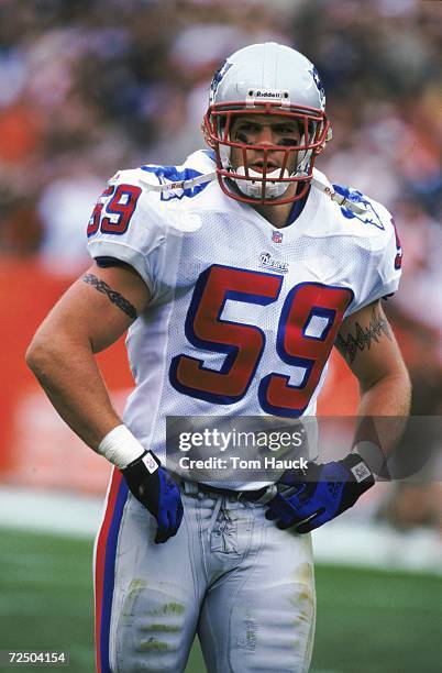 Andy Katzenmoyer of the New England Patriots looks off the field during the game against the Cleveland Browns at the Cleveland Stadium in Cleveland,...